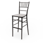 A black Chiavari barstool with a footrest