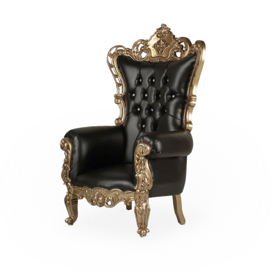 A black and gold throne chair set up at an event