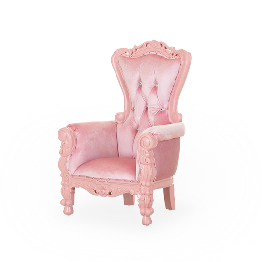 A pink throne chair for children at a party