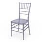 A clear acrylic ghost Chiavari chair at a modern event