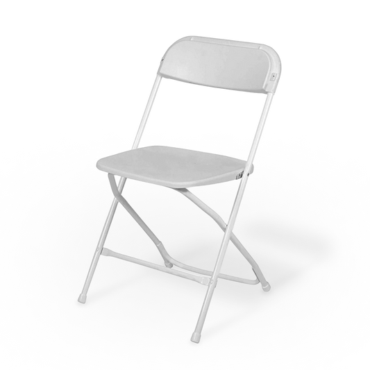 A white folding chair set up for an event